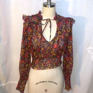 Free People size X-Small mesh floral top.